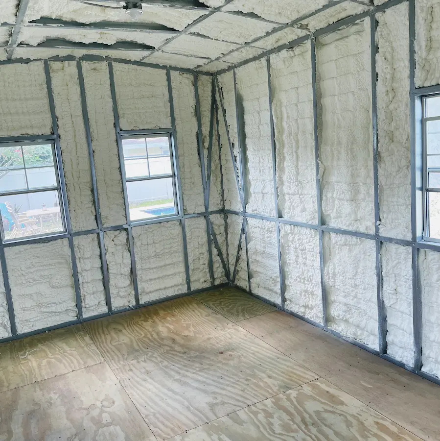 Closed-cell spray foam insulation applied to wall cavities in a residential project in Barnhart